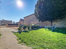 Maison avec jardin – 3 chambres – Cave – Double garage – Grenier aménageable