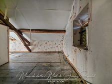 Maison avec jardin – 3 chambres – Cave – Double garage – Grenier aménageable