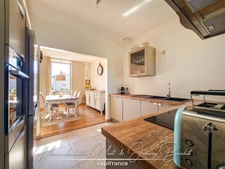 Maison avec jardin – 3 chambres – Cave – Double garage – Grenier aménageable