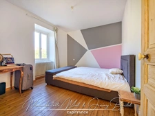 Maison avec jardin – 3 chambres – Cave – Double garage – Grenier aménageable