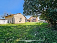 Maison avec jardin – 3 chambres – Cave – Double garage – Grenier aménageable