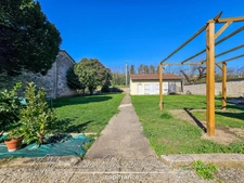 Maison avec jardin – 3 chambres – Cave – Double garage – Grenier aménageable