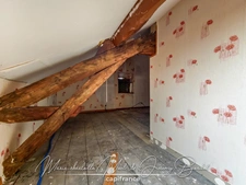 Maison avec jardin – 3 chambres – Cave – Double garage – Grenier aménageable