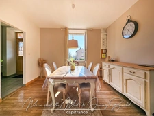 Maison avec jardin – 3 chambres – Cave – Double garage – Grenier aménageable