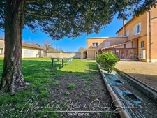Maison avec jardin – 3 chambres – Cave – Double garage – Grenier aménageable