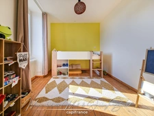 Maison avec jardin – 3 chambres – Cave – Double garage – Grenier aménageable