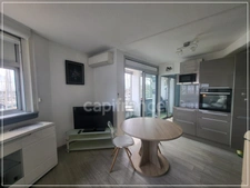 Appartement dans résidence sécurisée avec place de parking privée et cave
