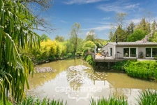 Proche SAINT-QUENTIN (02) : terrain de loisir 3200 m² au bord de l’Oise avec Chalet et potentiel locatif