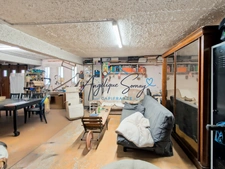 Maison jumelée avec jardin arboré, mezzanine et grand garage ».