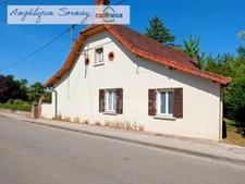 LOUHANS – 202 m² / 6 CHAMBRES / 2 500 m² / 4 GARAGES – UN POTENTIEL RARE !