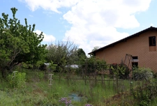 Attractive 117 m² villa with great potential and a beautiful wooded plot in CURCIAT DONGALON (01)
