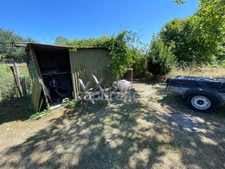Maison 1 chambre, grenier aménageable, grand garage.