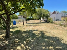 Maison 1 chambre, grenier aménageable, grand garage.