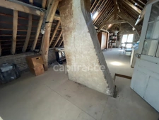 Maison 1 chambre, grenier aménageable, grand garage.