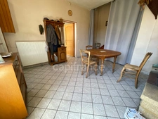 Maison 1 chambre, grenier aménageable, grand garage.