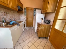 Maison 1 chambre, grenier aménageable, grand garage.