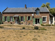 Maison 1 chambre, grenier aménageable, grand garage.