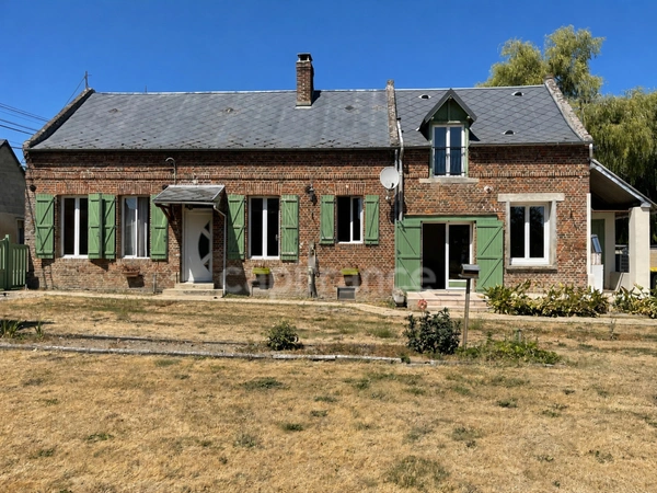 Maison 1 chambre, grenier aménageable, grand garage.