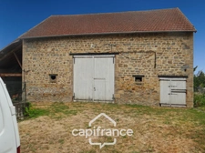 Maison et grange en pierres à rénover – Fort potentiel au cœur du bourg