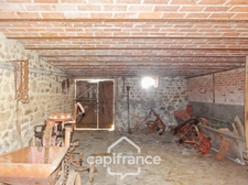 Maison et grange en pierres à rénover – Fort potentiel au cœur du bourg