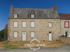 Maison et grange en pierres à rénover – Fort potentiel au cœur du bourg