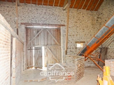 Maison et grange en pierres à rénover – Fort potentiel au cœur du bourg