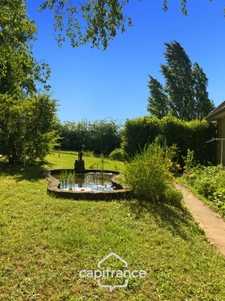 Maison à vendre 9 pièces MONTLUCON (03) sur terrain de 3600 m2 avec piscine et puits .