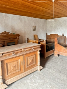 Maison et grange en pierres à rénover – Fort potentiel au cœur du bourg