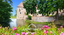 Château à vendre au coeur du bocage bourbonnais sur un parc de 1,5 Ha                                  