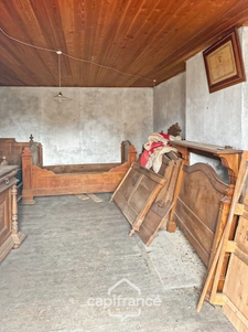 Maison et grange en pierres à rénover – Fort potentiel au cœur du bourg