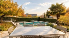 Maison à vendre 6 pièces CHALLEX (01) Maison familiale de 152 m² avec piscine chauffée et jardin paysager