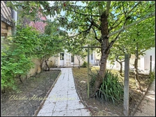 House for sale in PARTHENAY (79) - 6 rooms - 4 bedrooms - plot of approximately 250 m² - close to the town center