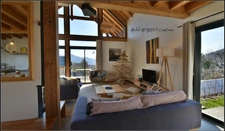 Rare à la vente, chalet d’architecte ouvert sur lac et montagnes sur Puy-Saint-Eusèbe (05)