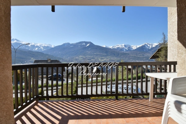 Appartement T2 bis plein sud, terrasse, parking – Entre lac et centre ville