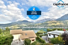 Savines-le-Lac – Appartement rénové avec vue imprenable sur le lac de Serre-Ponçon, balcon et terrasse plein sud