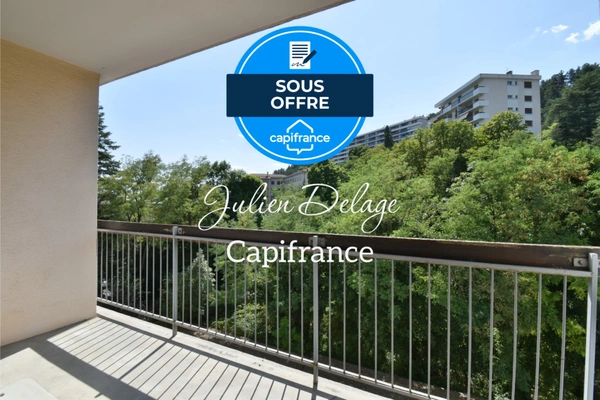 Appartement T3 traversant à rénover avec balcon, cave et parking privatif