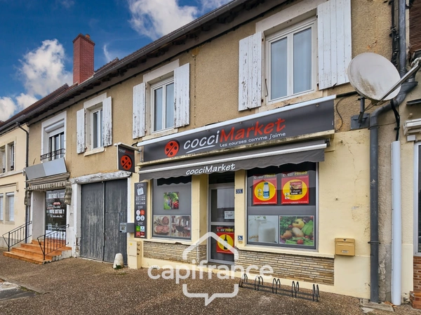 BOULLERET (18) – Immeuble de rapport avec commerces et logement loué 