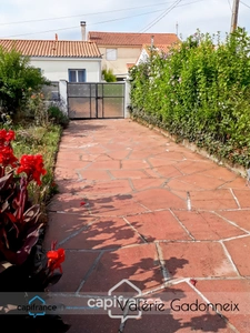 Maison individuelle avec jardin et garage proche centre-ville 