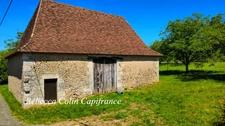 Ensemble en pierre à rénover avec grange