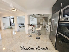 Maison familiale de 131 m² avec 4 chambres, véranda et grand garage à AYET