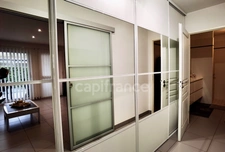 Gard department (30), for sale: 3-room house of 91 m², terrace, land of approximately 65m², garage, parking space, co-ownership, swimming pool.