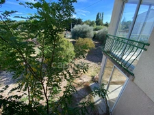 UZES 4km, village with all amenities: House with large grounds, double garage and commanding view!