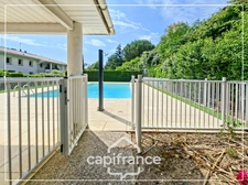 Appartement climatisé 3 pièces avec jardin, parking, cave et piscine commune
