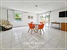 Appartement climatisé 3 pièces avec jardin, parking, cave et piscine commune