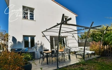 Hérault department (34), for sale in SAINT-ANDRE DE SANGONIS, modern 4-bedroom villa of 86m² on 300m² of land with a covered terrace under a pergola and above-ground swimming pool