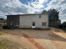 À VENDRE – Ensemble immobilier d’exception en pierre avec fonds de commerce bien-être et vue panoramique 