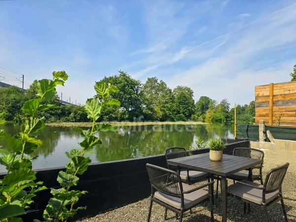 Neuville-sur-Sarthe - Terrain de loisirs de 425 m² en bord de Sarthe. Posez vos valises et profitez ! 
