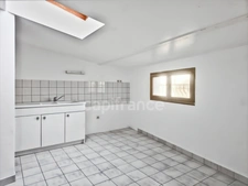 Immeuble de rapport au Grand-Lucé comprenant un local commercial et un appartement