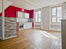 Immeuble de rapport au Grand-Lucé comprenant un local commercial et un appartement