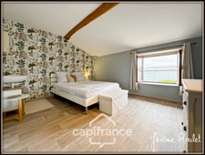 Stone house for sale, 6 rooms, 4 bedrooms + independent studio on 3,260 m² of land with outbuildings, Champigny-En-Rochereau (86)